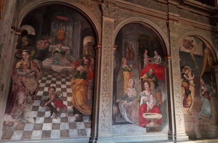 Close-up of three paintings located inside the sanctuary.