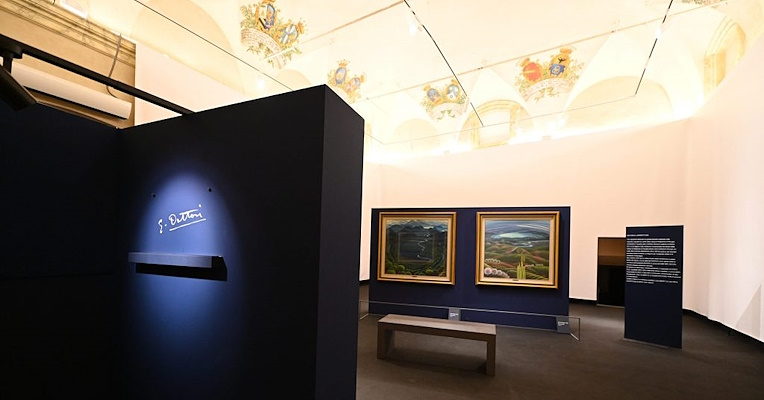 Exhibition hall showcasing Gerardo Dottori's works, Futurist landscapes, and a luminous signature at the Perugia Foundation.