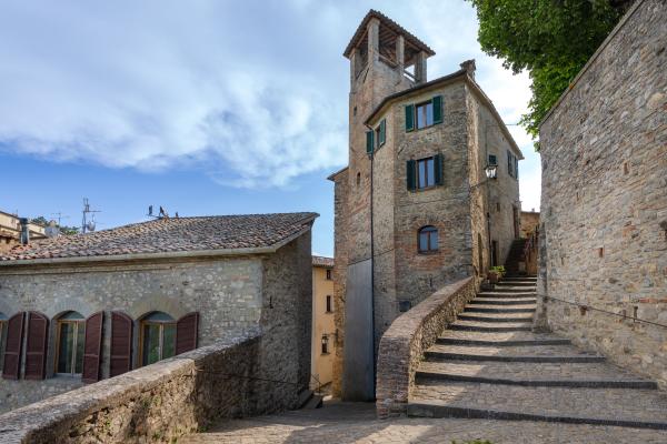  Stone steps leading to Montone’s Civic Tower, among medieval alleys and stone houses. 