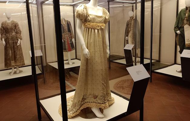Alexandrine Bonaparte’s dress, white with black polka dots, featuring a wide neckline and a train