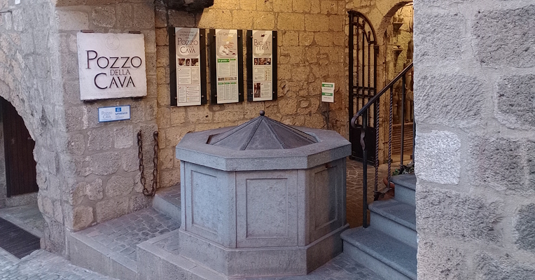  Entrance to Pozzo della Cava with the UNESCO recognition sign 