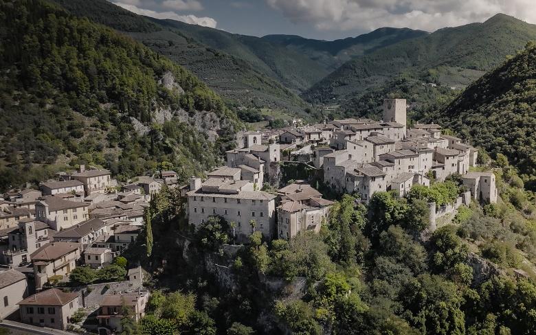  View of Arrone, a medieval village perched on a hill surrounded by mountains. 