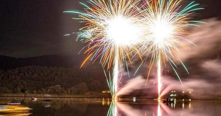  Night-time lake view with fireworks 
