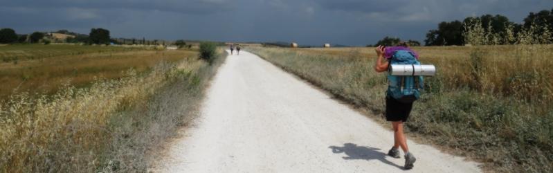Aerial view of the hermitage built on the rocky slope, surrounded by natural landscape.